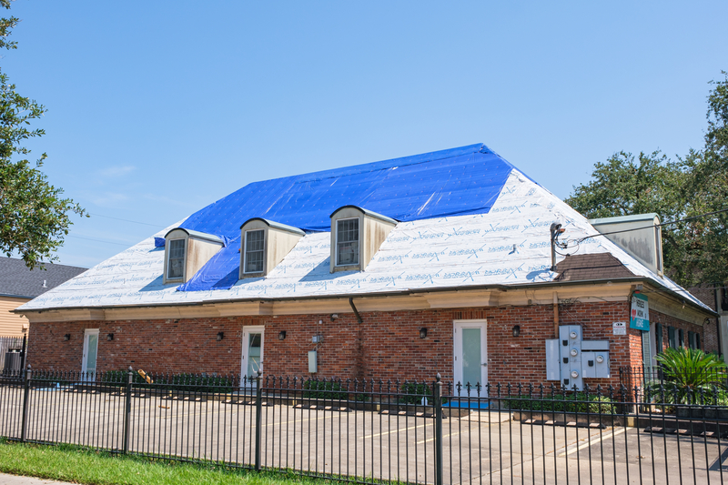 Tarp on commercial roof