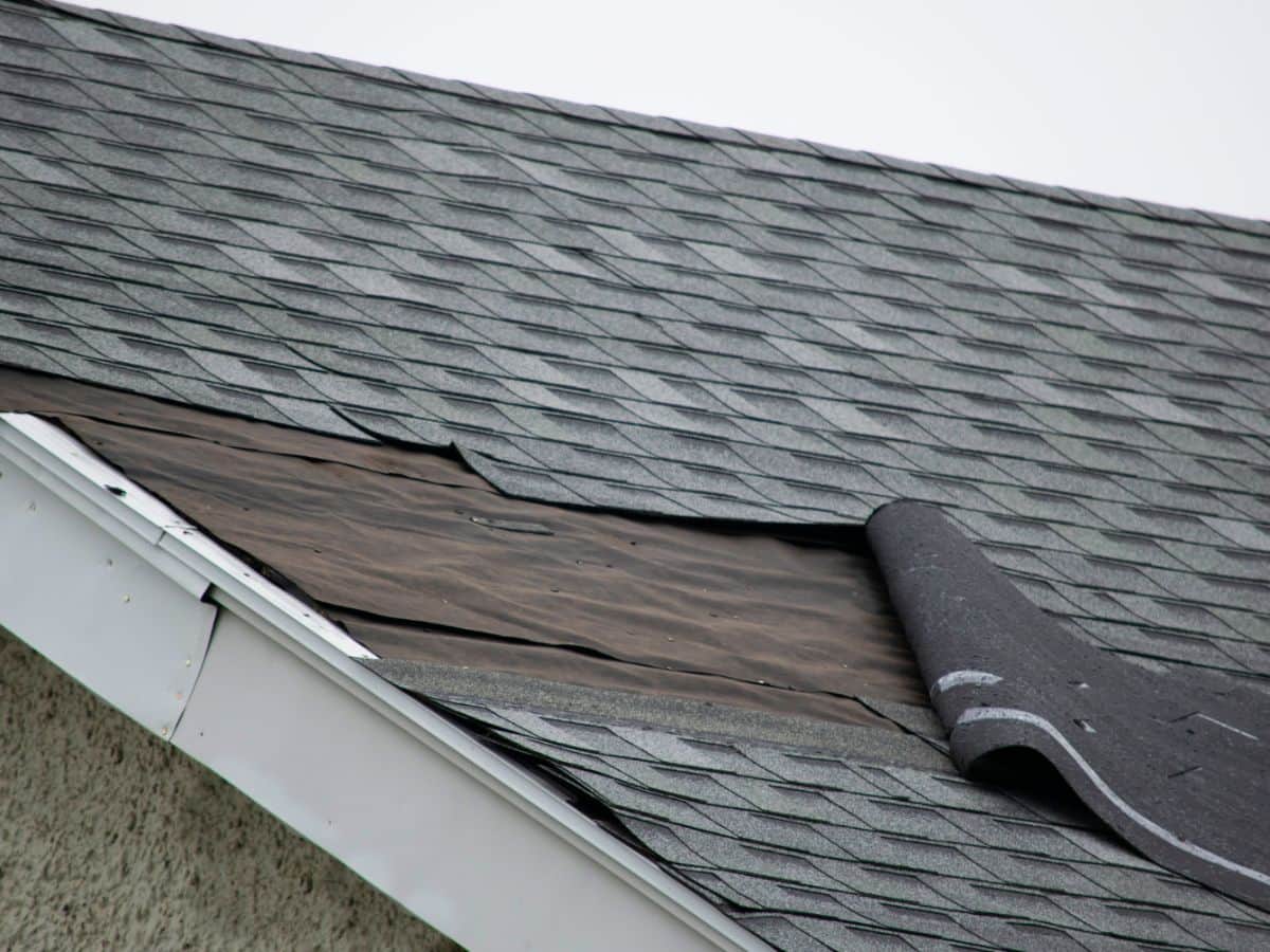 damages shingles due to storm
