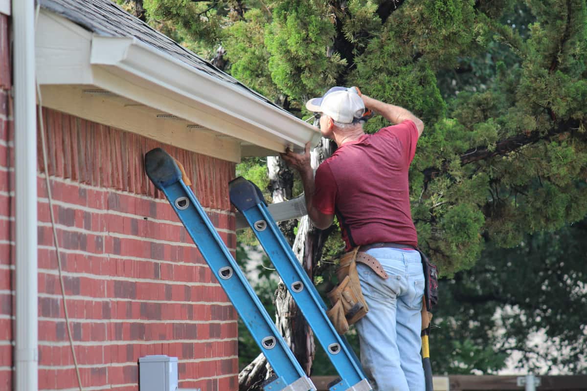 person gutter repair